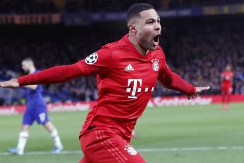 Bayern's Serge Gnabry celebrates after scoring his side's second goal during the Champions League round of 16 soccer match between Chelsea and Bayern Munich at Stamford Bridge in London, England, Tuesday, Feb. 25, 2020. (AP Photo/Frank Augstein)