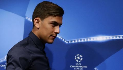 Juventus' Paulo Dybala arrives for a press conference at the Camp Nou stadium in Barcelona, Spain, Monday, Sept. 11, 2017.  FC Barcelona will play against Juventus in a Champions League Group D soccer match on Tuesday. (AP Photo/Manu Fernandez)