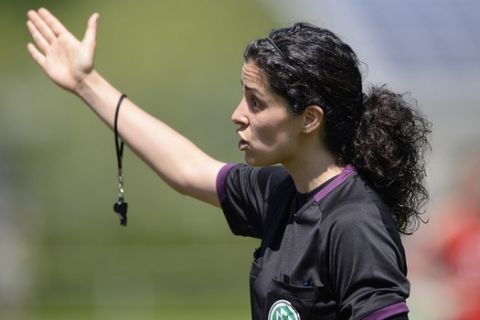 ASCHHEIM, GERMANY - MAY 18:  Referee Uelfet Car gestures during the B Junior Girls match between Bayern Muenchen and Turbine Potsdam at Sportpark Aschheim on May 18, 2013 in Aschheim, Germany. (Photo by Sebastian Widmann/Bongarts/Getty Images)