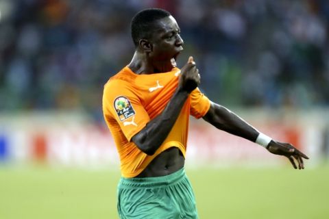 Ivory Coast player Max Alain Gradel, celebrates after he scored a goal against Cameroon during their African Cup of Nations Group D soccer match  at Estadio De Malabo in Malabo, Equatorial Guinea, Wednesday, Jan. 28, 2015. (AP Photo/Sunday Alamba)