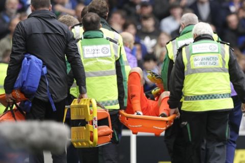 Tottenham's goalkeeper Hugo Lloris is taken away on a stretcher after an injury during the English Premier League soccer match between Brighton and Hove Albion and Tottenham Hotspur at Falmer stadium in Brighton, England Saturday, Oct. 5, 2019. (AP Photo/Kirsty Wigglesworth)