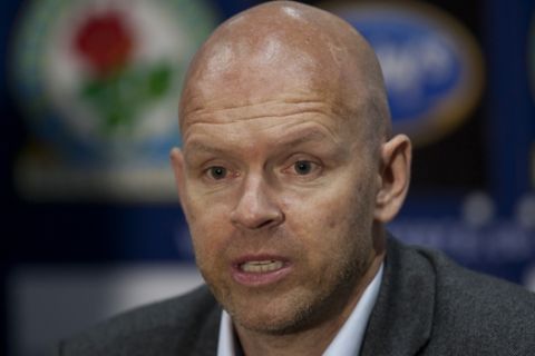 Blackburn's new manager Henning Berg answers questions during a press conference at Ewood Park Stadium, Blackburn, England, Thursday Nov. 1, 2012. Berg who won the Premier League title as a player with Blackburn Rovers in 1995 succeeds Steve Kean who resigned to end a troubled spell as manager. (AP Photo/Jon Super) 