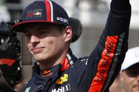Red Bull driver Max Verstappen of the Netherland's gives the thumbs up after taking his first career pole position for the Hungarian Formula One Grand Prix after qualification at the Hungaroring racetrack in Mogyorod, northeast of Budapest, Hungary, Saturday, Aug. 3, 2019. The Hungarian Formula One Grand Prix takes place on Sunday. (AP Photo/Laszlo Balogh)