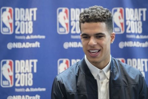 Missouri's Michael Porter Jr. speaks to reporters during a media availability with the top basketball prospects in the NBA Draft, Wednesday, June 20, 2018, in New York. (AP Photo/Mary Altaffer)