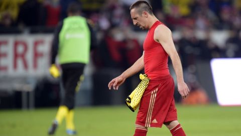 Bayern's Franck Ribery of France leaves the pitch disappointed after losing the German first division Bundesliga soccer match between Borussia Dortmund and Bayern Munich in Dortmund , Germany, Wednesday, April 11, 2012. Dortmund defeated Bayern with 1-0. (AP Photo/Martin Meissner) - NO MOBILE USE UNTIL 2 HOURS AFTER THE MATCH, WEBSITE USERS ARE OBLIGED TO COMPLY WITH DFL-RESTRICTIONS, SEE INSTRUCTIONS FOR DETAILS -