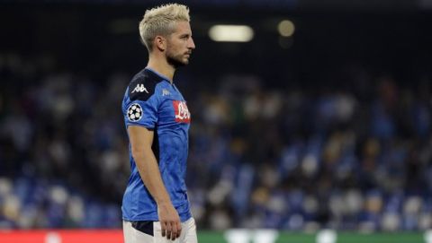 Napoli's Dries Mertens scorer of the first goal leaves the pitch after the Champions League Group E soccer match between Napoli and Liverpool, at the San Paolo stadium in Naples, Italy, Tuesday, Sept. 17, 2019. Napoili won 2-0. (AP Photo/Gregorio Borgia)