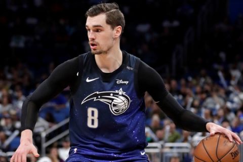 Orlando Magic's Mario Hezonja moves the ball against the Washington Wizards during the second half of an NBA basketball game, Wednesday, April 11, 2018, in Orlando, Fla. (AP Photo/John Raoux)