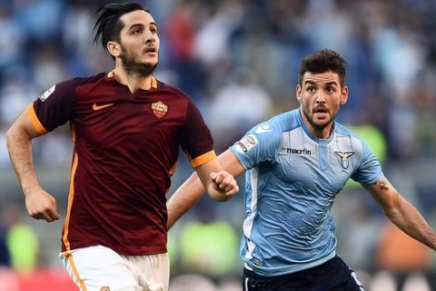 Roma's defender from Greece Kostas Manolas (L) vies with Lazio's forward from Serbia Filip Djordjevic during the Italian Serie A football match AS Roma vs SS Lazio on November 8, 2015 at Olympic stadium in Rome.  AFP PHOTO / FILIPPO MONTEFORTE        (Photo credit should read FILIPPO MONTEFORTE/AFP/Getty Images)