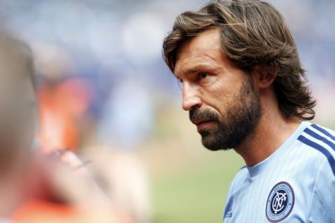 New York City FC's Andrea Pirlo, of Italy, walks off the pitch after warming up before an MLS soccer game against Orlando City SC at Yankee Stadium, Sunday, July 26, 2015, in New York. New York defeated Orlando 5-3. (AP Photo/Jason DeCrow)  
