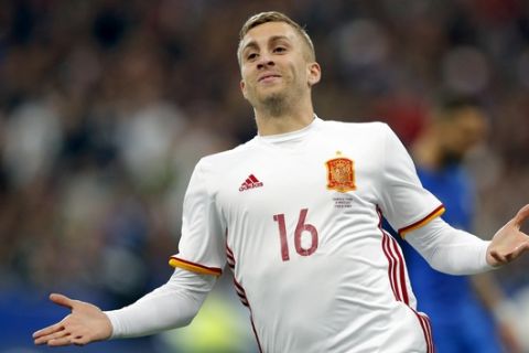 Spain's Gerard Deulofeu celebrates after scoring his side's 2nd goal during the international friendly soccer match between France and Spain at the Stade de France in Paris, France, Tuesday, March 28, 2017. (AP Photo/Christophe Ena)