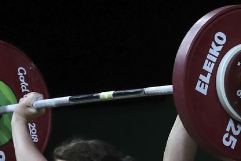 Wales's Laura Hughes competes in Women's 75Kg Weightlifting at the Commonwealth Games in Gold Coast, Australia, Sunday, April 8, 2018. (AP Photo/Manish Swarup)