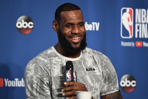 CLEVELAND, OH - JUNE 07:  LeBron James of the Cleveland Cavaliers addresses the media during practice and media availability as part of the 2018 NBA Finals on June 07, 2018 at Quicken Loans Arena in Cleveland, Ohio. NOTE TO USER: User expressly acknowledges and agrees that, by downloading and or using this photograph, User is consenting to the terms and conditions of the Getty Images License Agreement. Mandatory Copyright Notice: Copyright 2018 NBAE (Photo by Garrett Ellwood/NBAE via Getty Images)