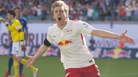 Leipzig's Emil Forsberg celebrates after scoring a goal during the German second division Bundesliga soccer match between RB Leipzig and Karlsruhe SC at the Red Bull Arena soccer stadium in Leipzig, Germany, Sunday, May 8, 2016. RB Leipzig can clinch the promotion to the German first division Bundesliga after this match. (AP Photo/Jens Meyer)