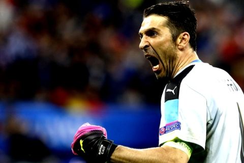 FILE -- In this June 13, 2016 file photo, Italy's goalkeeper Gianluigi Buffon celebrates after Emanuele Giaccherini scored during the Euro 2016 Group E soccer match between Belgium and Italy at the Grand Stade in Decines-Charpieu, near Lyon, France. Twenty years after he made his Italy debut on a snowy pitch in a World Cup playoff in Russia, the Azzurri captain's international future hinges on another playoff against Sweden. If Italy advances, Buffon can conclude his Italy career where it started at next year's tournament in Russia. A loss would almost certainly mark his final appearance for the national team. (AP Photo/Laurent Cipriani)