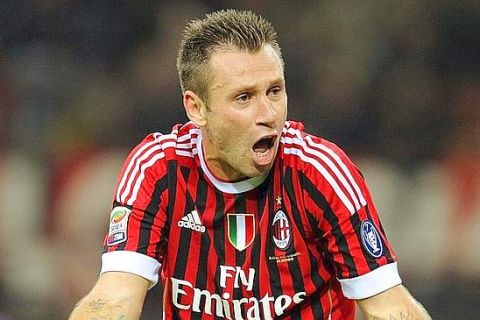 epa02981506 AC Milan forward Antonio Cassano reacts during the Italian Serie A soccer match against FC Parma at the Giuseppe Meazza stadium in Milan, Italy, 26 October 2011. Milan won 4-1 with three goals scored by Nocerino.  EPA/DANIEL DAL ZENNARO