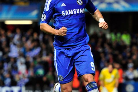Chelsea's Spanish striker Fernando Torres celebrates scoring his team's third goal during the UEFA Champions League, Group E, football match between Chelsea and KRC Genk at Stamford Bridge in London on October 19, 2011.  AFP PHOTO / GLYN KIRK (Photo credit should read GLYN KIRK/AFP/Getty Images)