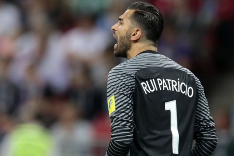Portugal goalkeeper Rui Patricio shouts during the Confederations Cup, semifinal soccer match between Portugal and Chile, at the Kazan Arena, Russia, Wednesday, June 28, 2017. (AP Photo/Ivan Sekretarev)