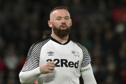 Derby's Wayne Rooney during the FA Cup fifth round soccer match between Derby County and Manchester United at Pride Park in Derby, England, Thursday, March 5, 2020. (AP Photo/Rui Vieira)