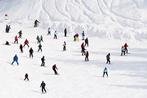 Mass downhill skiing nearby Bansko resort, Bulgaria