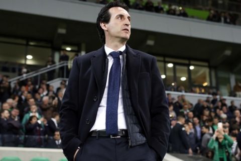 PSG's coach Unai Emery looks on before the French League One soccer match between Saint-Etienne and Paris Saint Germain, in Saint-Etienne, central France, Friday, April 6, 2018. (AP Photo/Laurent Cipriani)