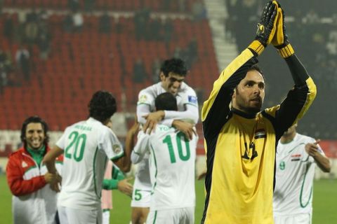 DOHA, QATAR - JANUARY 19:  Iraqi goalkeeper Mohammed Kassid celebrates after Iraq defeated DPR Korea at the AFC Asian Cup Group D match between Iraq and DPR Korea at Al-Rayyan on January 19, 2011 in Doha, Qatar.  (Photo by Robert Cianflone/Getty Images)