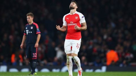 LONDON, ENGLAND - OCTOBER 20:  Olivier Giroud of Arsenal celebrates as he scores their first goal during the UEFA Champions League Group F match between Arsenal FC and FC Bayern Munchen at Emirates Stadium on October 20, 2015 in London, United Kingdom.  (Photo by Paul Gilham/Getty Images)