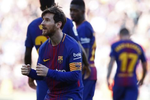 FC Barcelona's Lionel Messi celebrates after scoring during the Spanish La Liga soccer match between FC Barcelona and Athletic Bilbao at the Camp Nou stadium in Barcelona, Spain, Sunday, March 18, 2018. (AP Photo/Manu Fernandez)