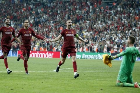 Liverpool teammates celebrate after winning the UEFA Super Cup soccer match between Liverpool and Chelsea, in Besiktas Park, in Istanbul, Wednesday, Aug. 14, 2019.(AP Photo/Lefteris Pitarakis)
