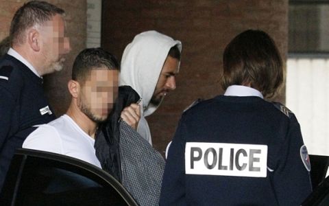 ALTERNATIVE CROP Real Madrid's French striker Karim Benzema leaves the court house in Versailles, near Paris, on November 5, 2015. Real Madrid striker Karim Benzema has admitted involvement in an alleged extortion case over a sex tape featuring fellow French international Mathieu Valbuena and appeared before judge today, legal sources said. The 27-year-old star told investigators he approached Valbuena about the tape on behalf of "a childhood friend."  AFP PHOTO / MATTHIEU ALEXANDREMATTHIEU ALEXANDRE/AFP/Getty Images