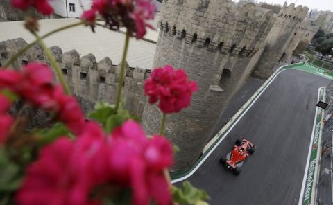 Finland driver Kimi Raikkonen steers his Ferrari during the second practice session at the Baku Formula One city circuit, in Baku, Azerbaijan, Friday, April 27, 2018. The Formula one race will be held on Sunday. (AP Photo/Luca Bruno)