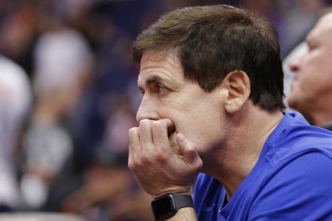 Dallas Mavericks owner Mark Cuban watches the action in the second half during an NBA basketball game against the Phoenix Suns, Thursday, Dec. 13, 2018, in Phoenix. Phoenix defeated Dallas 99-89. (AP Photo/Rick Scuteri)