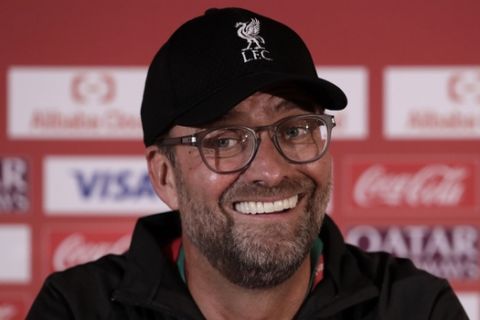 Liverpool's manager Jurgen Klopp speaks during a press conference in Doha, Qatar, Friday, Dec. 20, 2019. Liverpool will play the Club World Cup final soccer match against Flamengo in Doha on December 21. (AP Photo/Hassan Ammar)