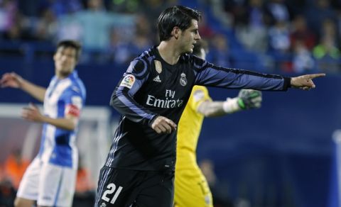Real Madrid's Alvaro Morata celebrates after scoring his side's second goal against Leganes during a Spanish La Liga soccer match between Leganes and Real Madrid at the Butarque stadium in Madrid, Wednesday, April 5, 2017. Morata scored a hat-trick on Madrid's 4-2 victory. (AP Photo/Francisco Seco)