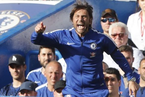Chelsea coach Antonio Conte reacts during the English Premier League soccer match between Chelsea and Liverpool at Stamford Bridge stadium in London, Sunday, May 6, 2018. (AP Photo/Frank Augstein)