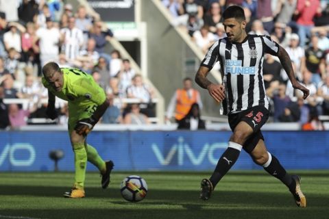 Newcastle United's Aleksandar Mitrovic scores his side's third goal of the game during the English Premier League soccer match between Newcastle United and West Ham United at Saint Jamess Park Stadium, Newcastle, England, Saturday, Aug, 26, 2017. (Owen Humphreys/PA via AP)
