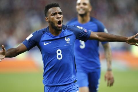 France's Thomas Lemar reacts after scoring France' s second goal during the World Cup Group A qualifying soccer match between France and The Netherlands at the Stade de France stadium in Saint-Denis, outside Paris, Thursday, Aug.31, 2017. (AP Photo/Christophe Ena)