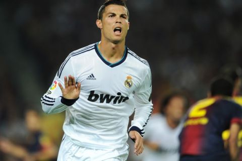 BARCELONA, SPAIN - OCTOBER 07:  Cristiano Ronaldo of Real Madrid celebrates scoring his sides opening goal during the la Liga match between FC Barcelona and Real Madrid at the Camp Nou stadium on October 7, 2012 in Barcelona, Spain.  (Photo by Jasper Juinen/Getty Images)