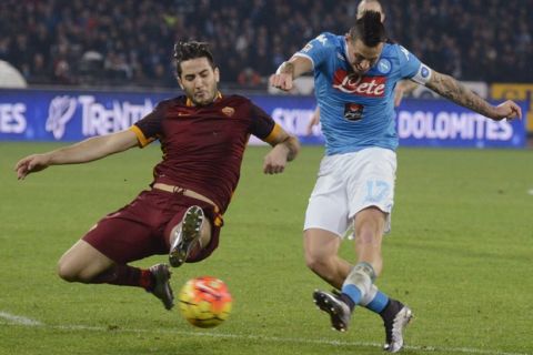 Napoli's Marek Hamík, right, shoots at the goal as Roma's Kostas Manolas tries to stop him during a Serie A soccer match between Napoli and Roma, at the San Paolo stadium in Naples, Italy, Sunday, Dec. 13, 2015. (AP Photo/Salvatore Laporta)