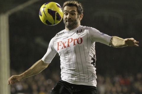 Fulham's Giorgos Karagounis plays against West Ham United during their English Premier League soccer match at Craven Cottage, London, Wednesday, Jan. 30, 2013. (AP Photo/Sang Tan)