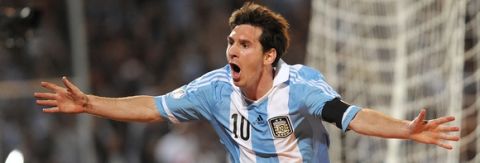 Argentine forward Lionel Messi celebrates after scoring against Uruguay during their Brazil 2014 FIFA World Cup South American qualifier football match at Malvinas Argentinas stadium in Mendoza, some 1050 km west of Buenos Aires, on October 12, 2012. AFP PHOTO / ANDRES-LARROVERE        (Photo credit should read ANDRES LARROVERE/AFP/Getty Images)