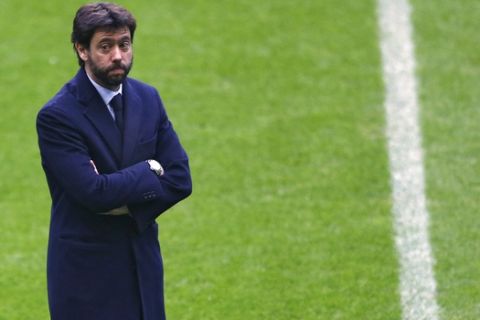 FILE- In this file photo dated Tuesday, March 15, 2016, Andrea Agnelli, president of Juventus, arrives at the Allianz Arena stadium prior to the Champions League soccer match between Bayern Munich and Juventus Turin in Munich, Germany. Juventus president Andrea Agnelli has been banned for a year by the Italian football federation for an allegedly illicit relationship with hard-core "ultra" fans that encouraged ticket scalping. The court also fined Juventus 300,000 euros ($350,000) on Monday, Sept. 25, 2017. (AP Photo/Matthias Schrader, FILE)