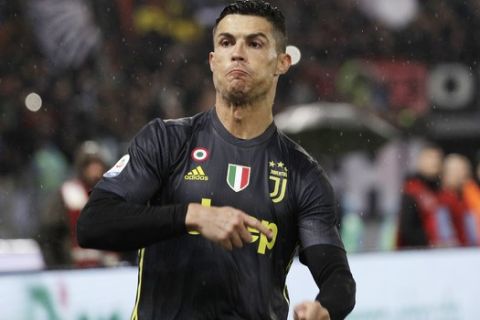 Juventus' Cristiano Ronaldo celebrates after scoring his side's second goal during the Serie A soccer match between Lazio and Juventus at the Olympic stadium, in Rome, Sunday, Jan. 27, 2019. (AP Photo/Gregorio Borgia)