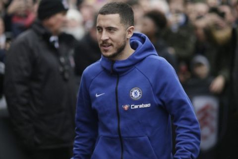 Chelsea's Eden Hazard arrives prior to the start of the English Premier League soccer match between Fulham and Chelsea at Craven Cottage stadium in London, England, Sunday, March 3, 2019. (AP Photo/Tim Ireland)