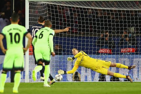 "PARIS, FRANCE - APRIL 06: Joe Hart of Manchester City saves the penalty by Zlatan Ibrahimovic of Paris Saint-Germain during the UEFA Champions League Quarter Final First Leg match between Paris Saint-Germain and Manchester City at Parc des Princes on April 6, 2016 in Paris, France.  (Photo by Clive Rose/Getty Images)"