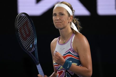 Victoria Azarenka of Belarus reacts after defeating Jessica Pegula of the U.S. in their quarterfinal match at the Australian Open tennis championship in Melbourne, Australia, Tuesday, Jan. 24, 2023. (AP Photo/Ng Han Guan)