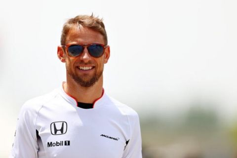 SHANGHAI, CHINA - APRIL 17:  Jenson Button of Great Britain and McLaren Honda in the Paddock ahead of the Formula One Grand Prix of China at Shanghai International Circuit on April 17, 2016 in Shanghai, China.  (Photo by Clive Mason/Getty Images)