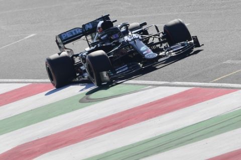 Mercedes driver Lewis Hamilton of Britain steers his car during the qualification ahead of the Grand Prix of Tuscany, at the Mugello circuit in Scarperia, Italy, Saturday, Sept. 12, 2020. The Formula One Grand Prix of Tuscany will take place on Sunday. (Claudio Giovannini, Pool Photo via AP)