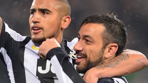 Juventus' forward Fabio Quagliarella (R) celebrates after scoring a goal with teammate midfielder of Chile Arturo Vidal during the Champions League match Juventus vs Celtic FC on March 6, 2013   at the "Juventus Stadium" in Turin.   AFP PHOTO / GIUSEPPE CACACE        (Photo credit should read GIUSEPPE CACACE/AFP/Getty Images)