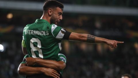 Sporting's Bruno Fernandes celebrates after teammate Luiz Phellype scored the opening goal during the Europa League group D soccer match between Sporting CP and PSV Eindhoven at the Alvalade stadium in Lisbon, Thursday, Nov. 28, 2019. Fernandes scored twice in Sporting 4-0 victory. (AP Photo/Armando Franca)