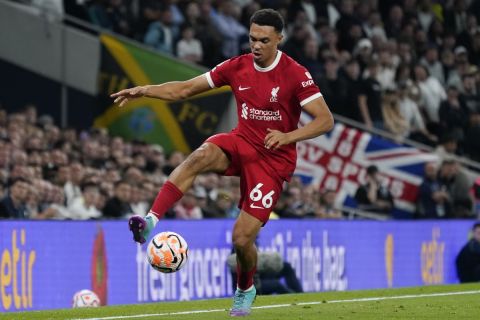 Liverpool's Trent Alexander-Arnold controls the ball during the English Premier League soccer match between Tottenham Hotspur and Liverpool at the Tottenham Hotspur Stadium, in London, England, Saturday, Sept. 30, 2023. (AP Photo/Alberto Pezzali)